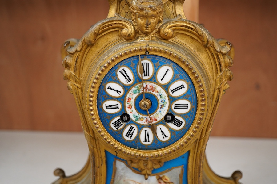 A 19th century French gilt metal mantel clock in Sevres style with gilt wood stand, 40cm total height